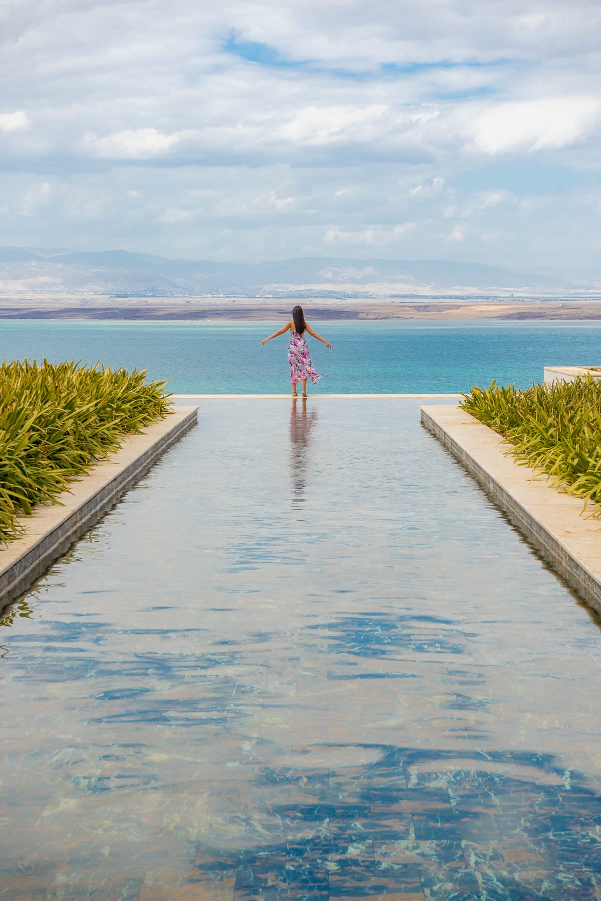 Girl in front of the infinity pool at Hilton Dead Sea Resort & Spa
