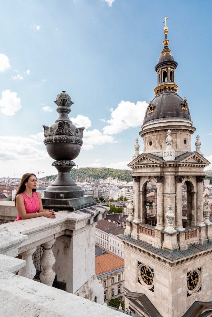 Girl in pink dress standing on the top of the St. Stephen Basilica