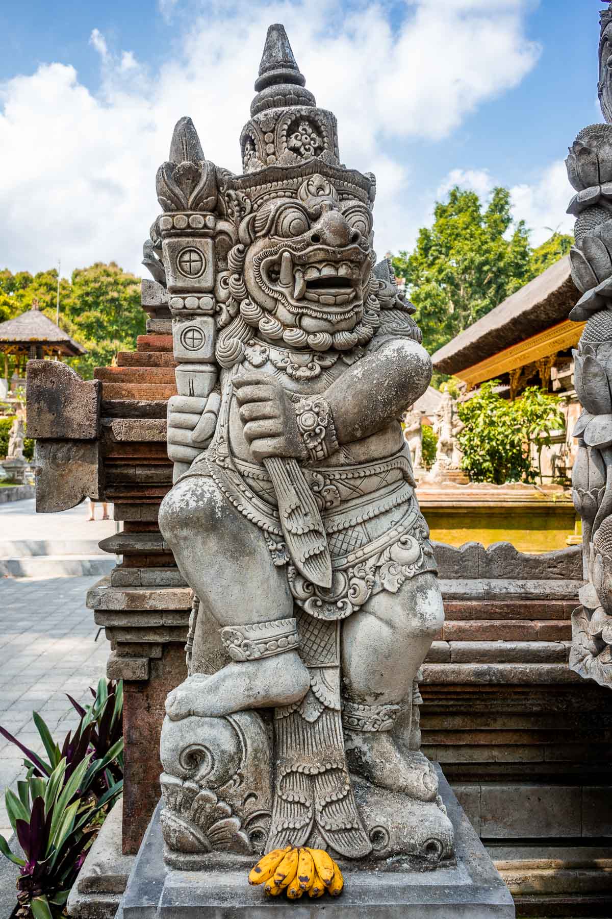 Stone statue at Pura Tirta Empul Temple in Bali