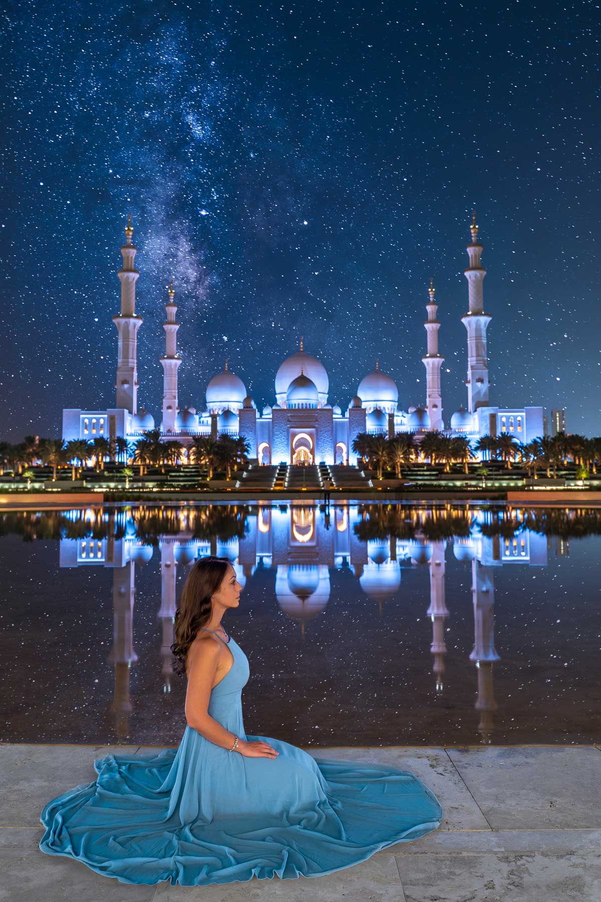 View of the Sheikh Zayed Grand Mosque at night with starry sky from Wahat al Karama, one of the most Instagrammable places in Abu Dhabi