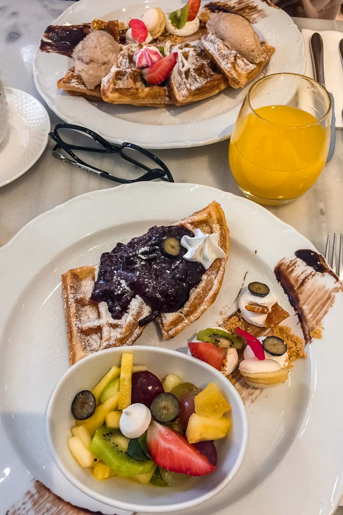 Waffles and fruits for breakfast at Á La Maison Grand Budapest