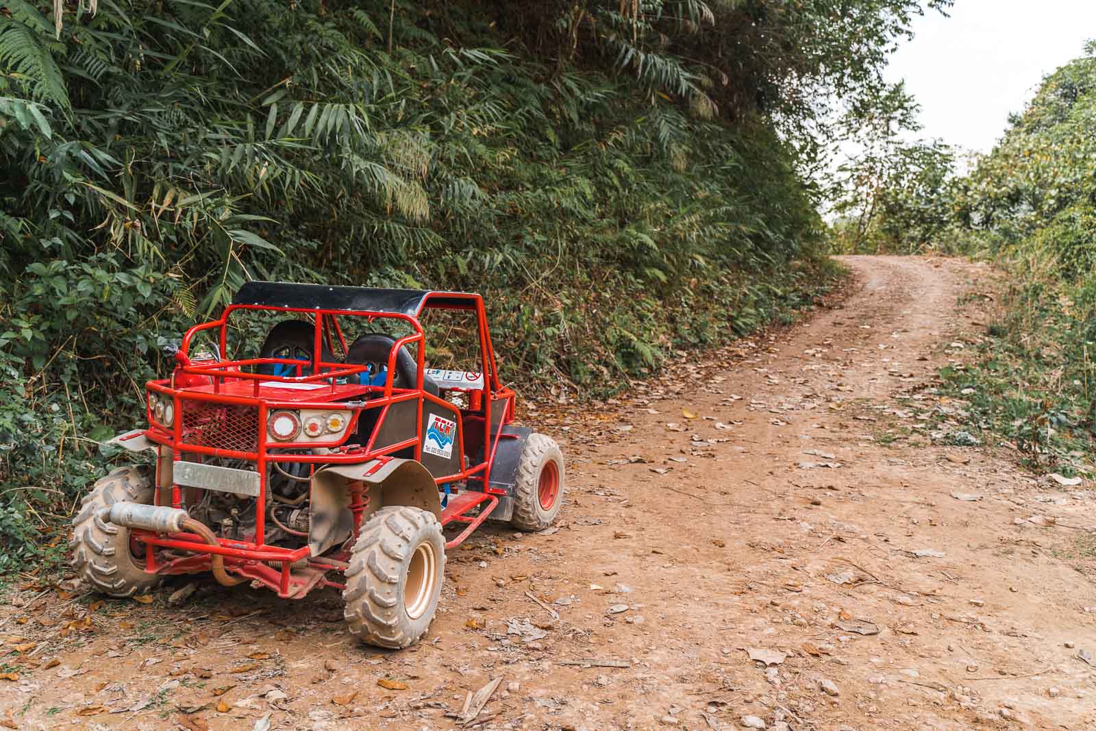 Red buggy on the roads in Vang Vieng