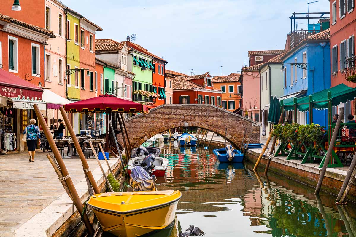 Colorful houses along the canal in Burano, Italy