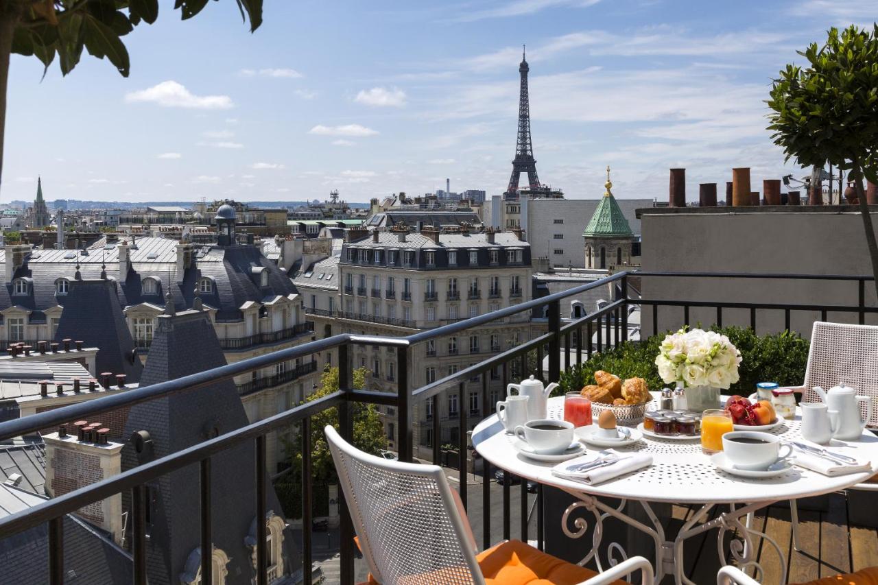 Beautiful terrace overlooking the Eiffel Tower at Hotel San Regis in Paris