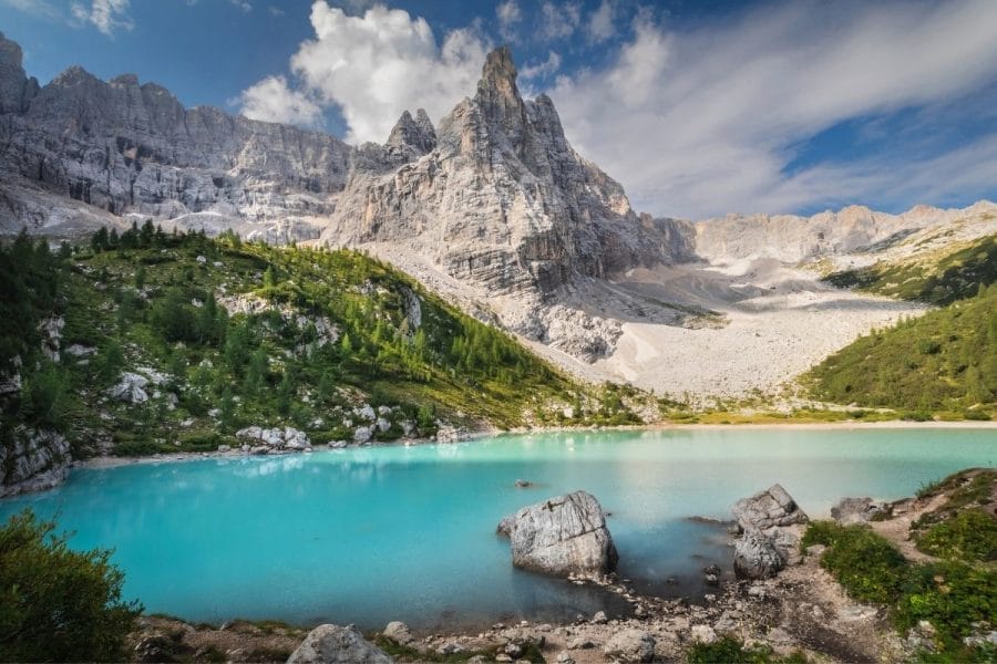 Beautiful blue body of water at Lago di Sorapis, one of the most beautiful lakes in the Dolomites