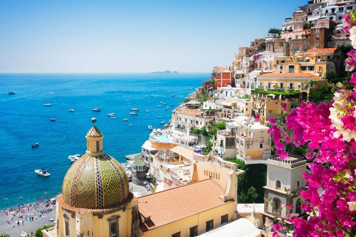 Panoramic view of Positano with flower in the Amalfi Coast in Italy