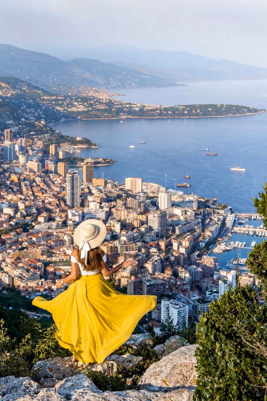 Panoramic view from Tete de Chien with girl in a yellow skirt in the middle