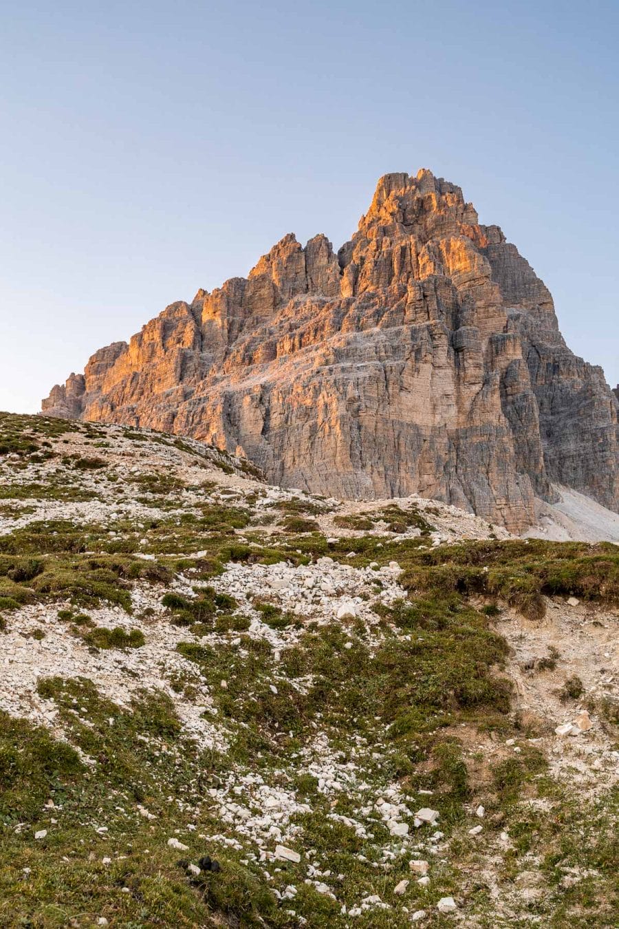 Sunset at Tre Cime di Lavaredo, which is a must visit on every Dolomites road trip itinerary