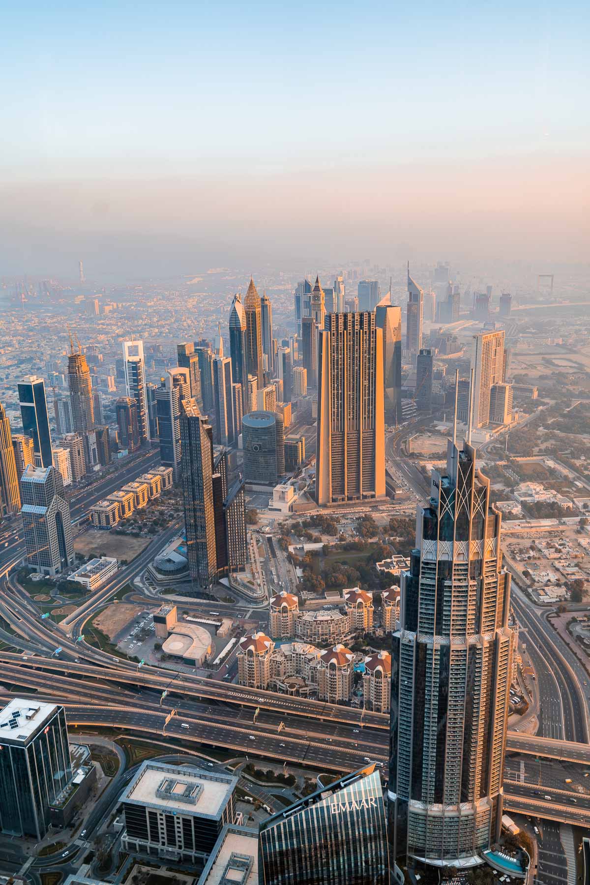 View of the Dubai skyline from the Burj Khalifa at sunrise