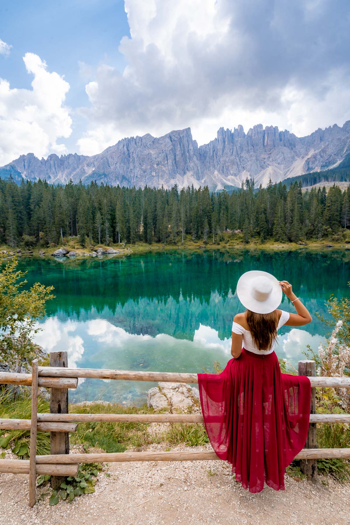 Girl at Lago di Carezza in the Dolomites, Italy