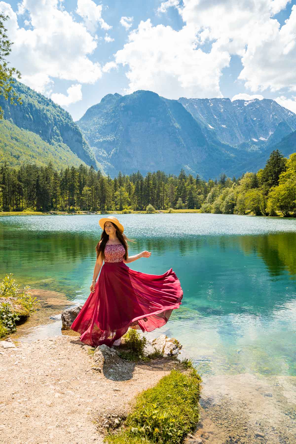 Girl in a red dress in front of Bluntausee, Austria