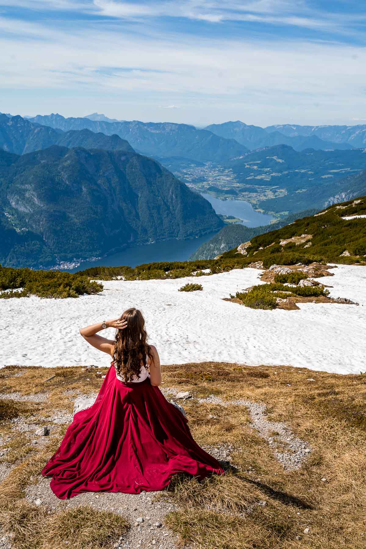 Girl in a red skirt on top of Dachstein Krippenstein