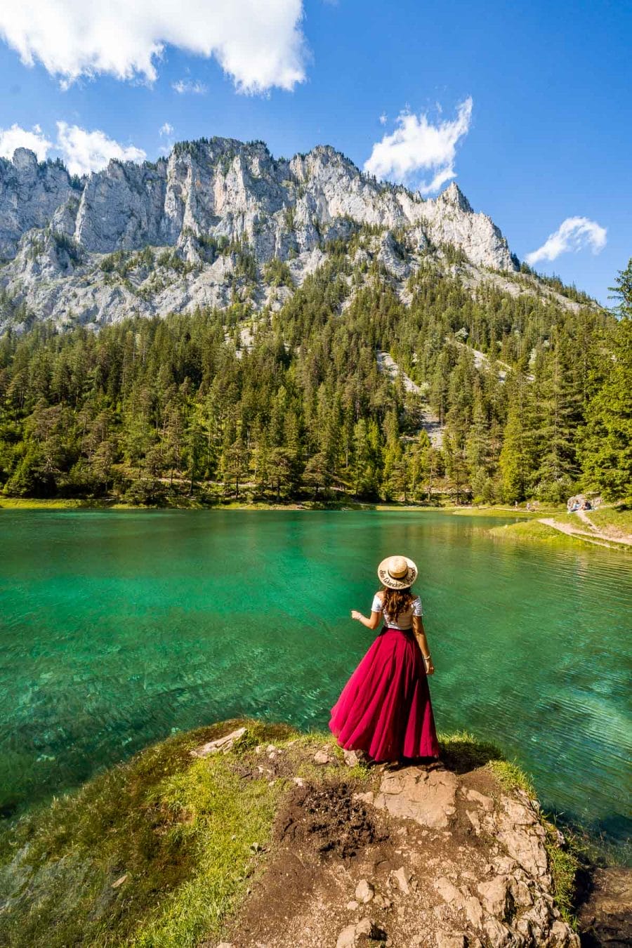 Girl in a red skirt in front of Grüner See, Austria