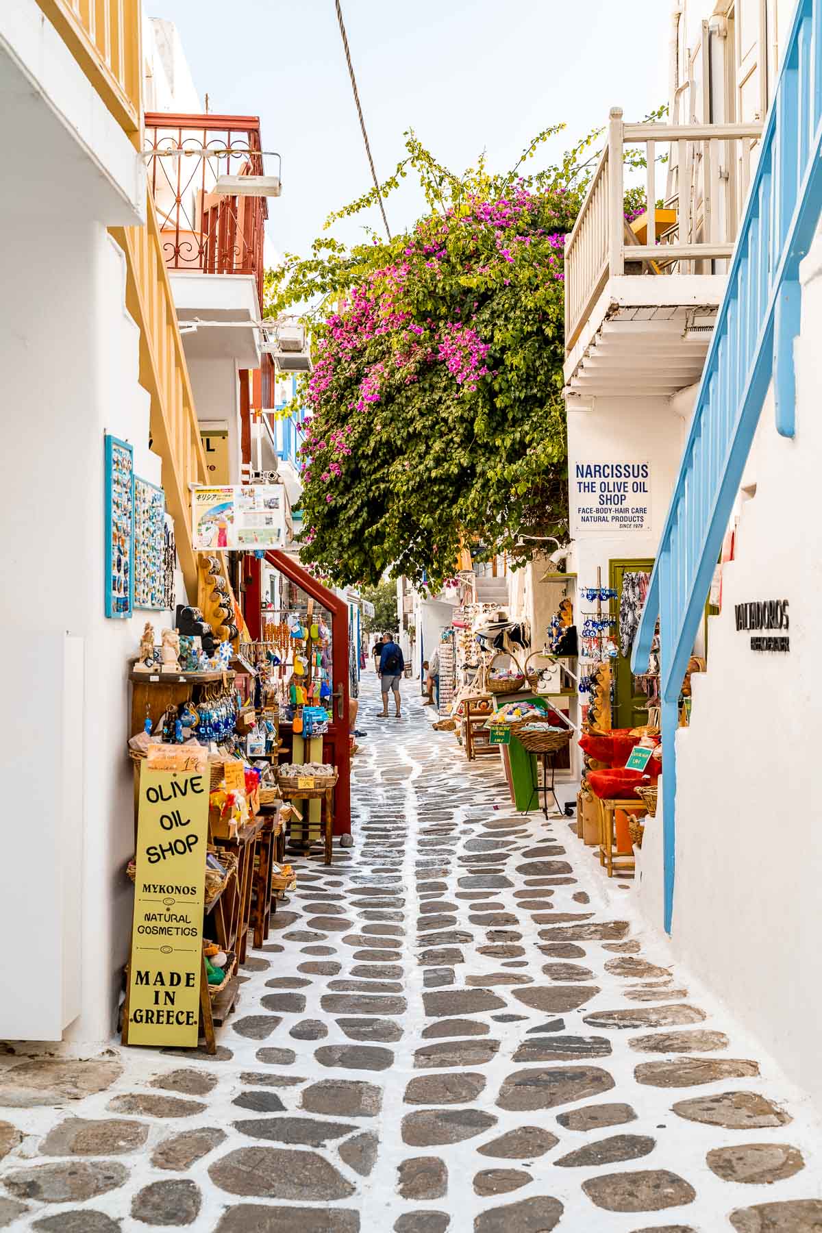 Painted streets with pink bougainvillea in Mykonos