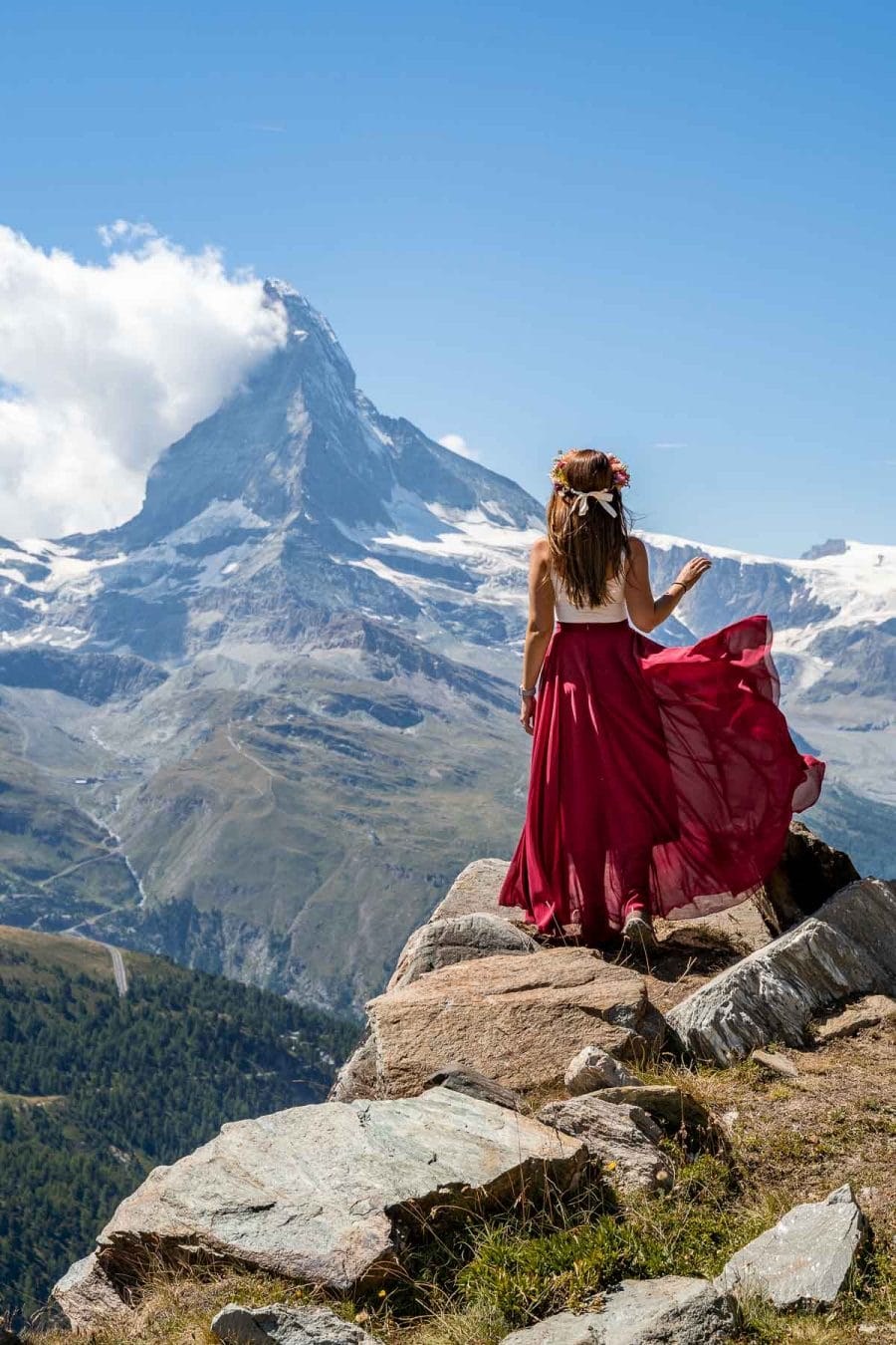 Girl in a red skirt in front of Matternhorn on the Zermatt 5 Lakes Hike