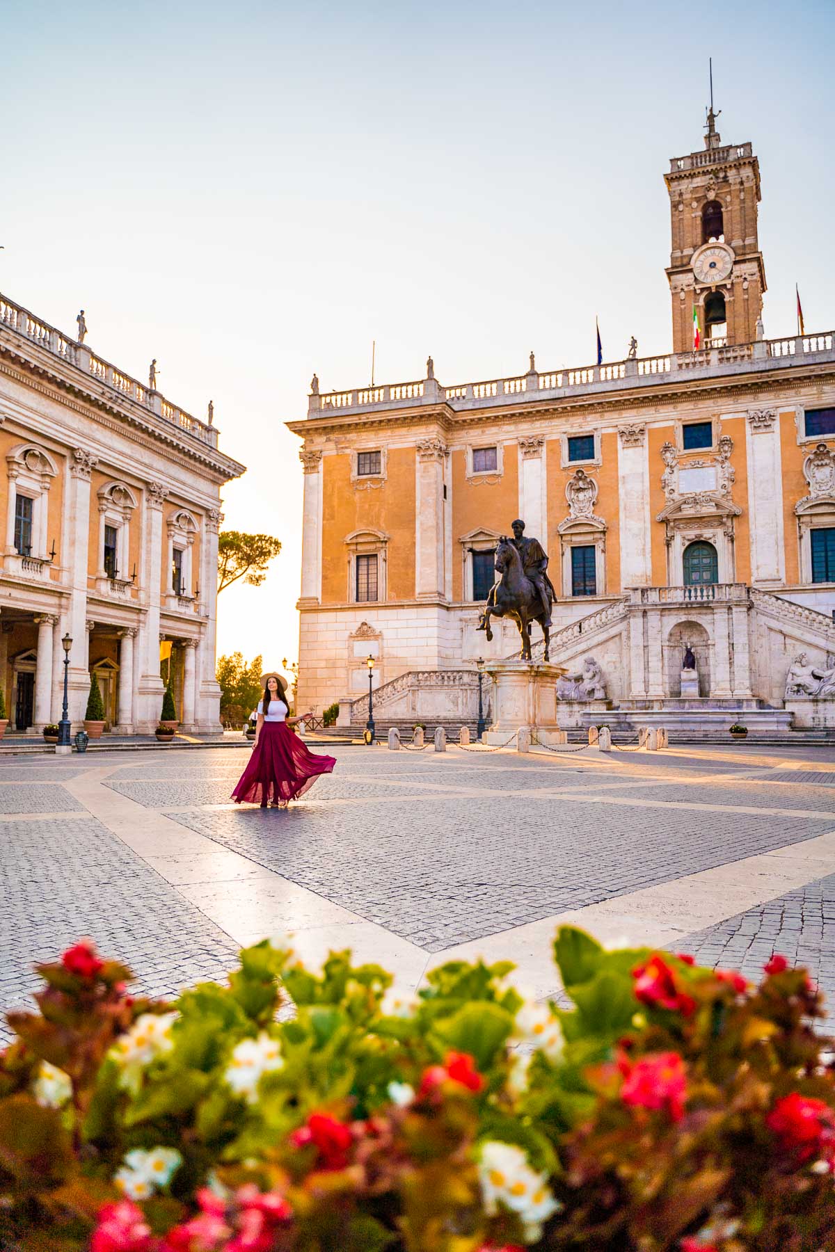 Girl in a red skirt in Piazza Campidoglio in Rome, Italy