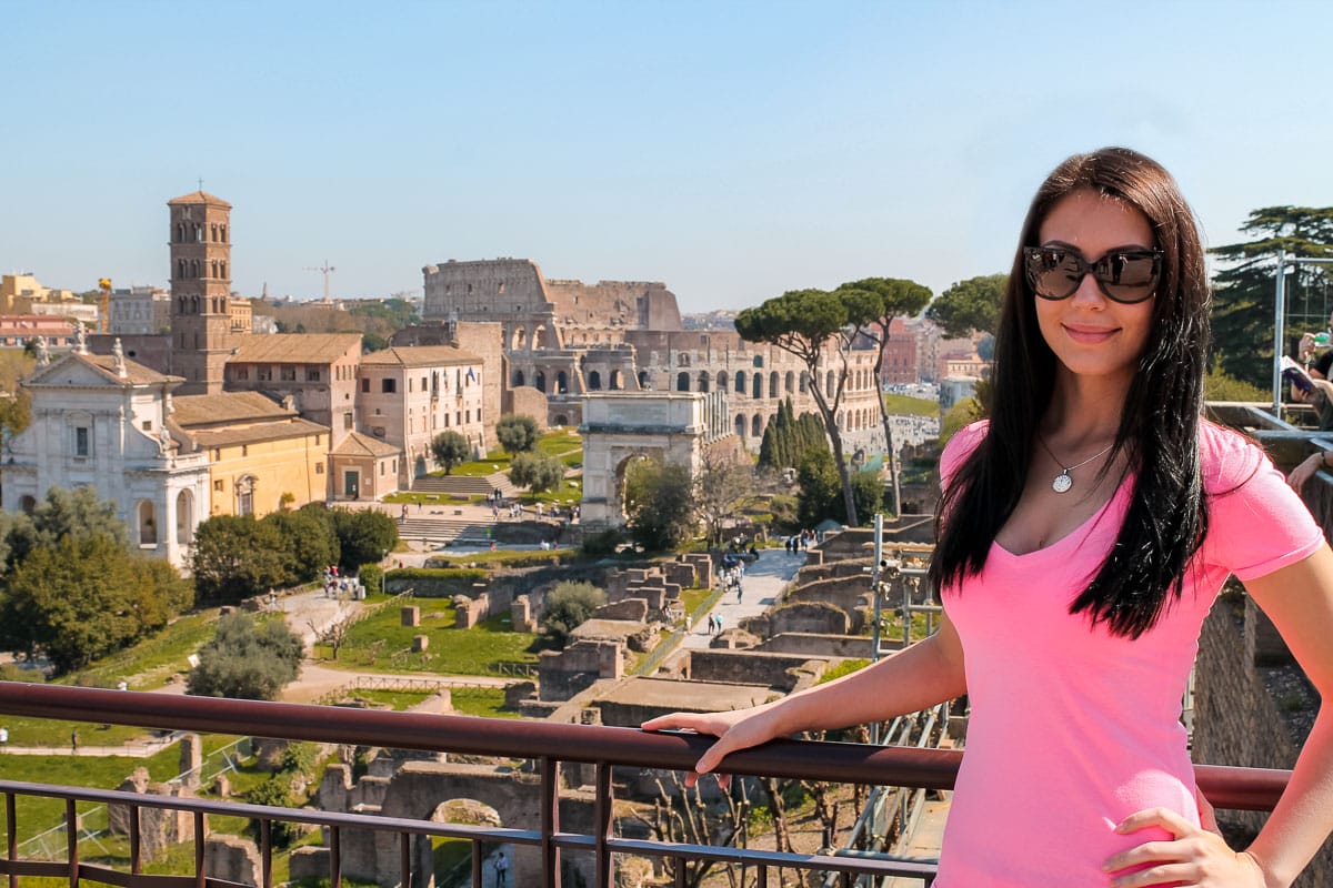 Girl in a pink skirt at the Forum Romanum in Rome, Italy