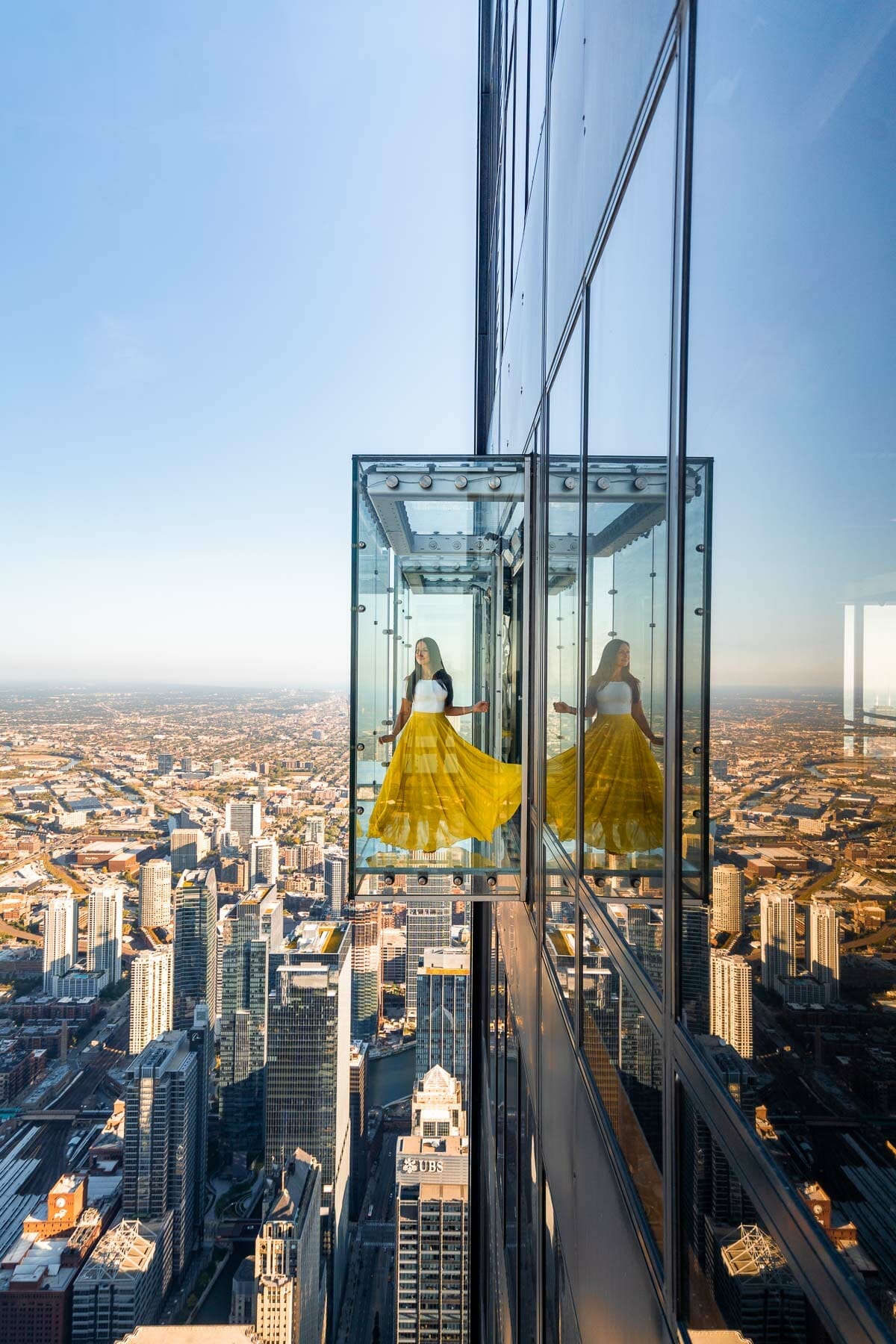 Girl in yellow skirt at Skydeck Chicago