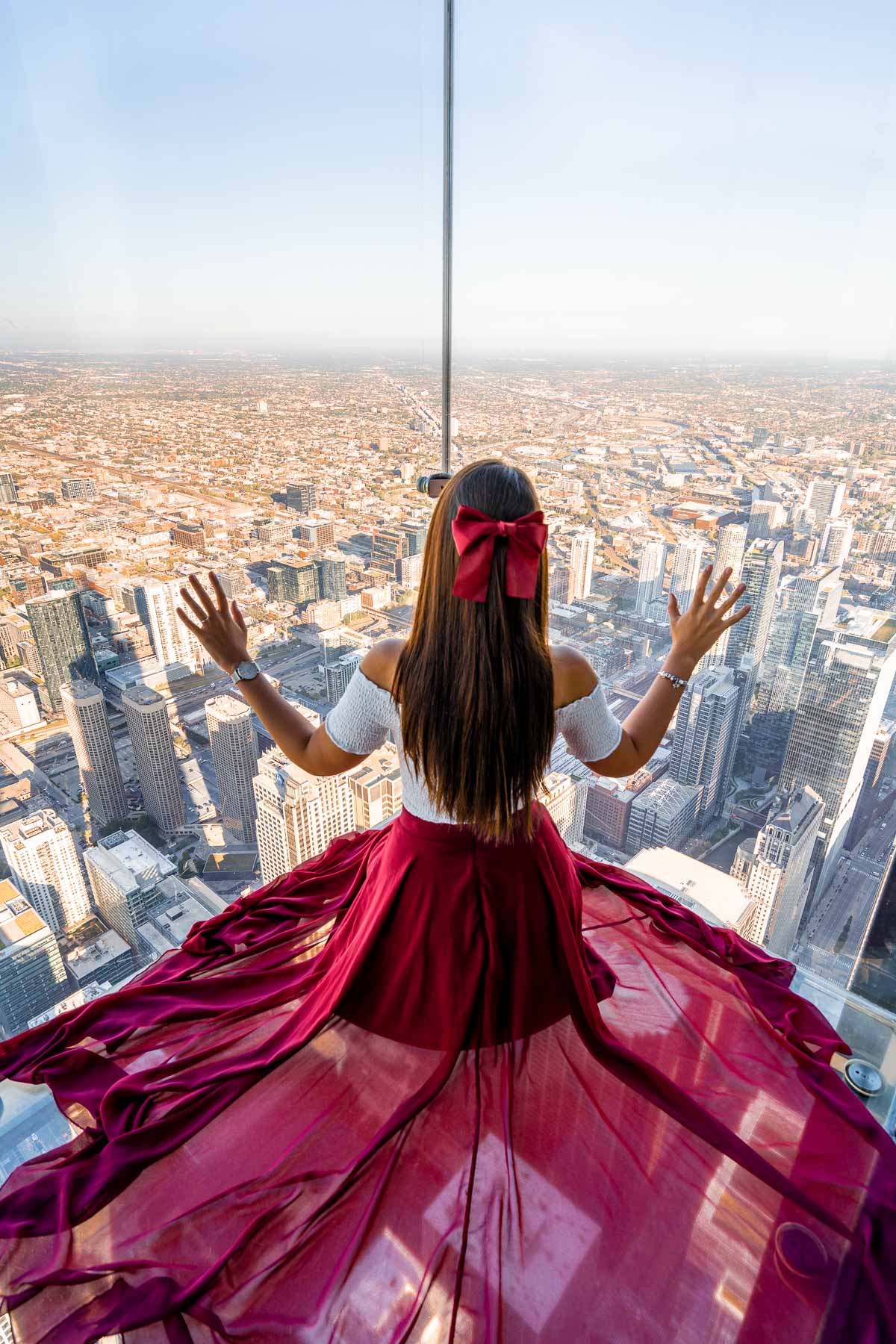 Girl in red skirt at Skydeck Chicago