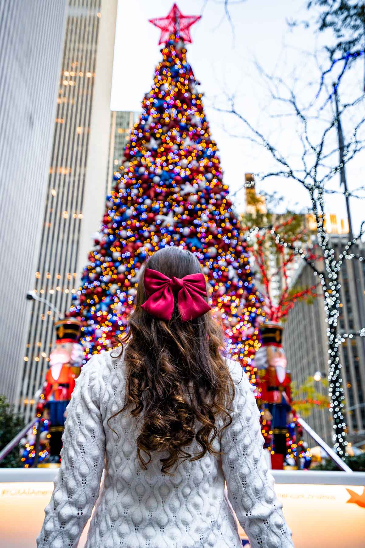 Girl in front of the Fox Square Christmas Tree in New York