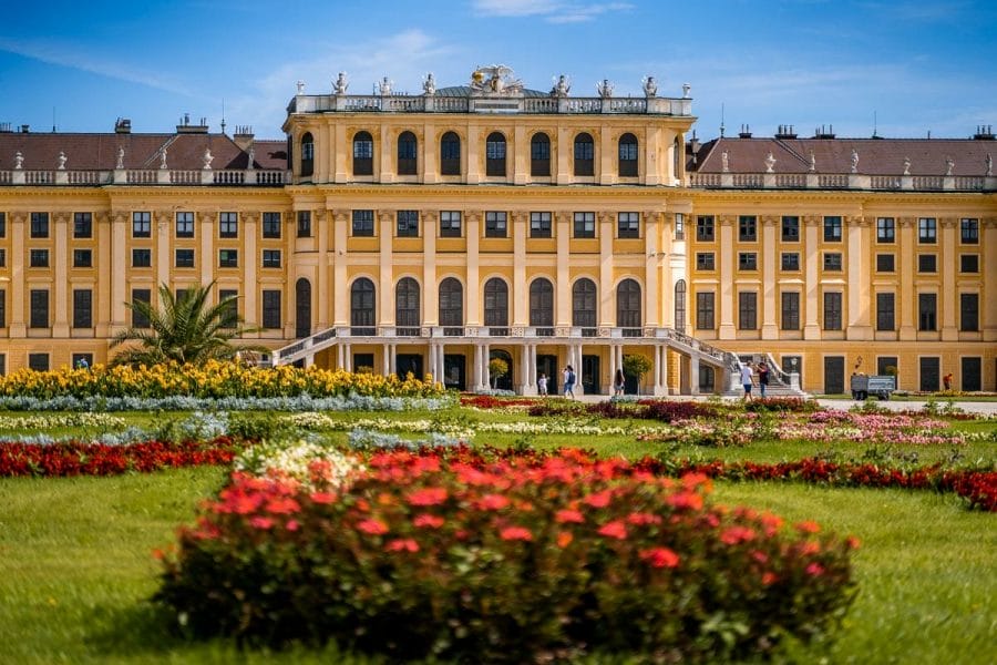 Schonbrunn Palace in Vienna with flowers in the foreground