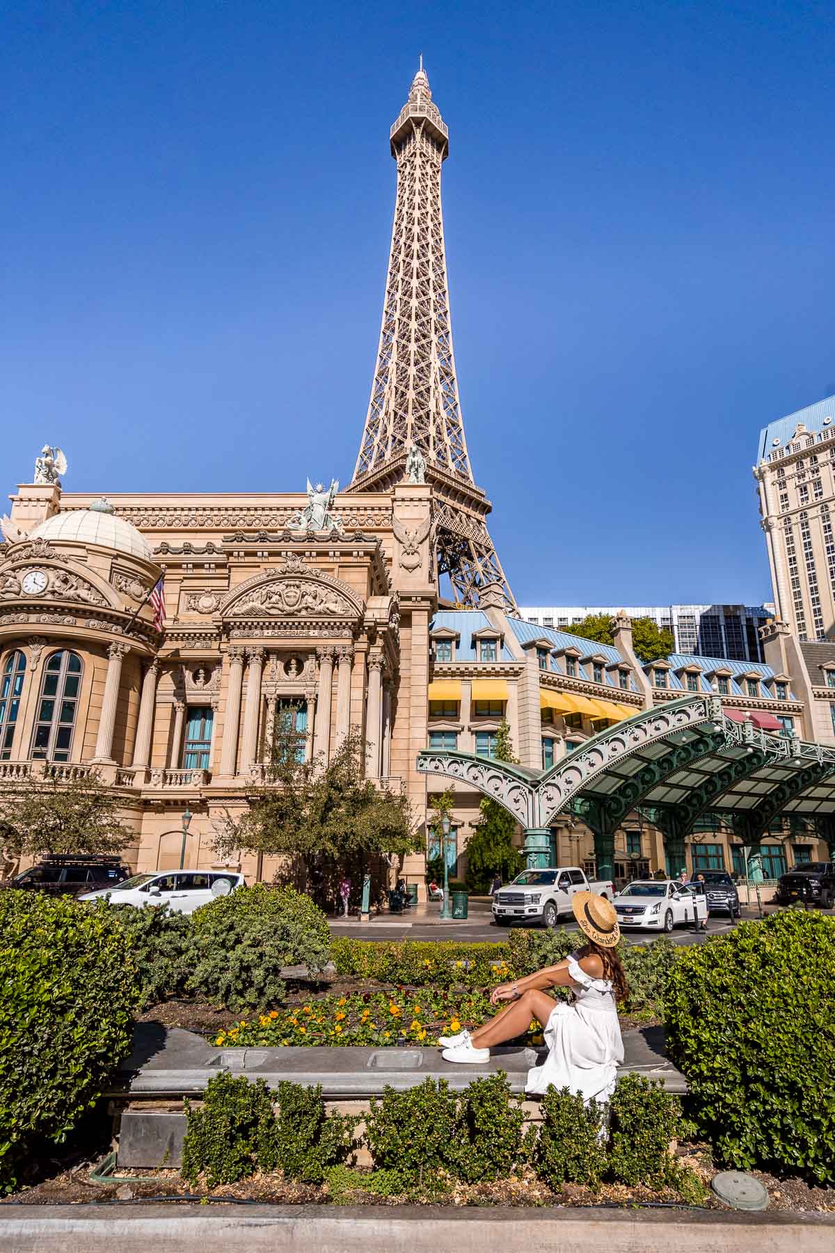 Girl in white dress in front of the Eiffel Tower at Paris Las Vegas