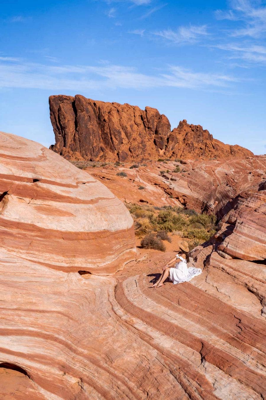 Girl in white dress on the Fire Wave Hike in Valley of Fire State Park