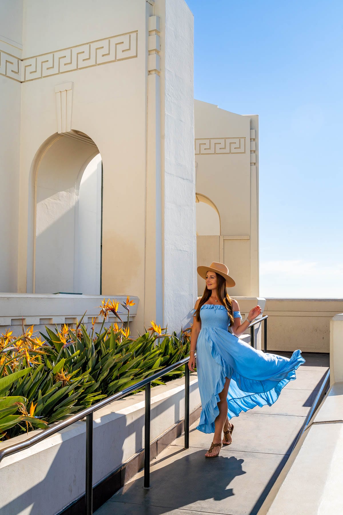 Girl in blue dress at Griffith Observatory, one of the best LA Instagram spots