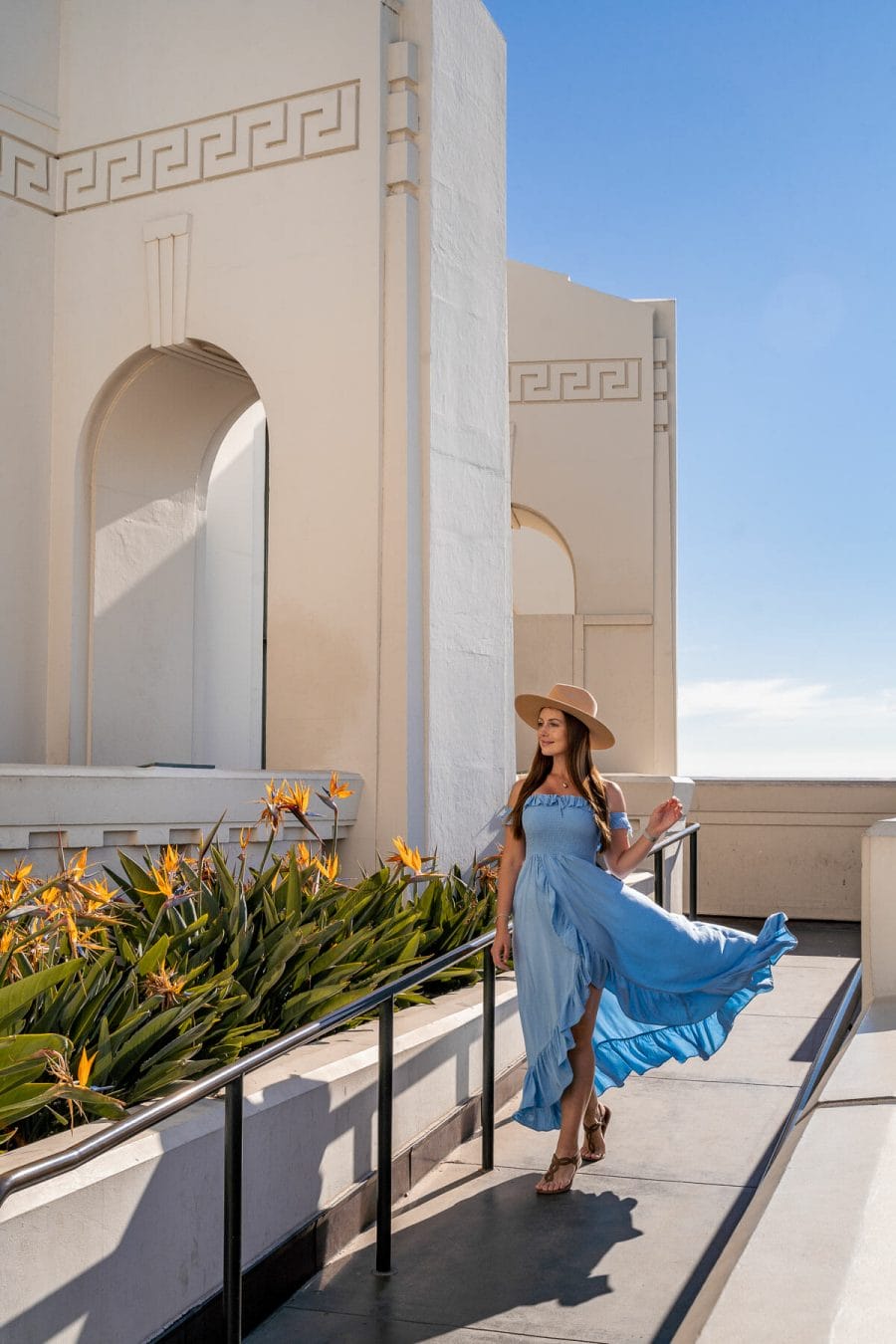 Girl in blue dress at Griffith Observatory, one of the best LA Instagram spots