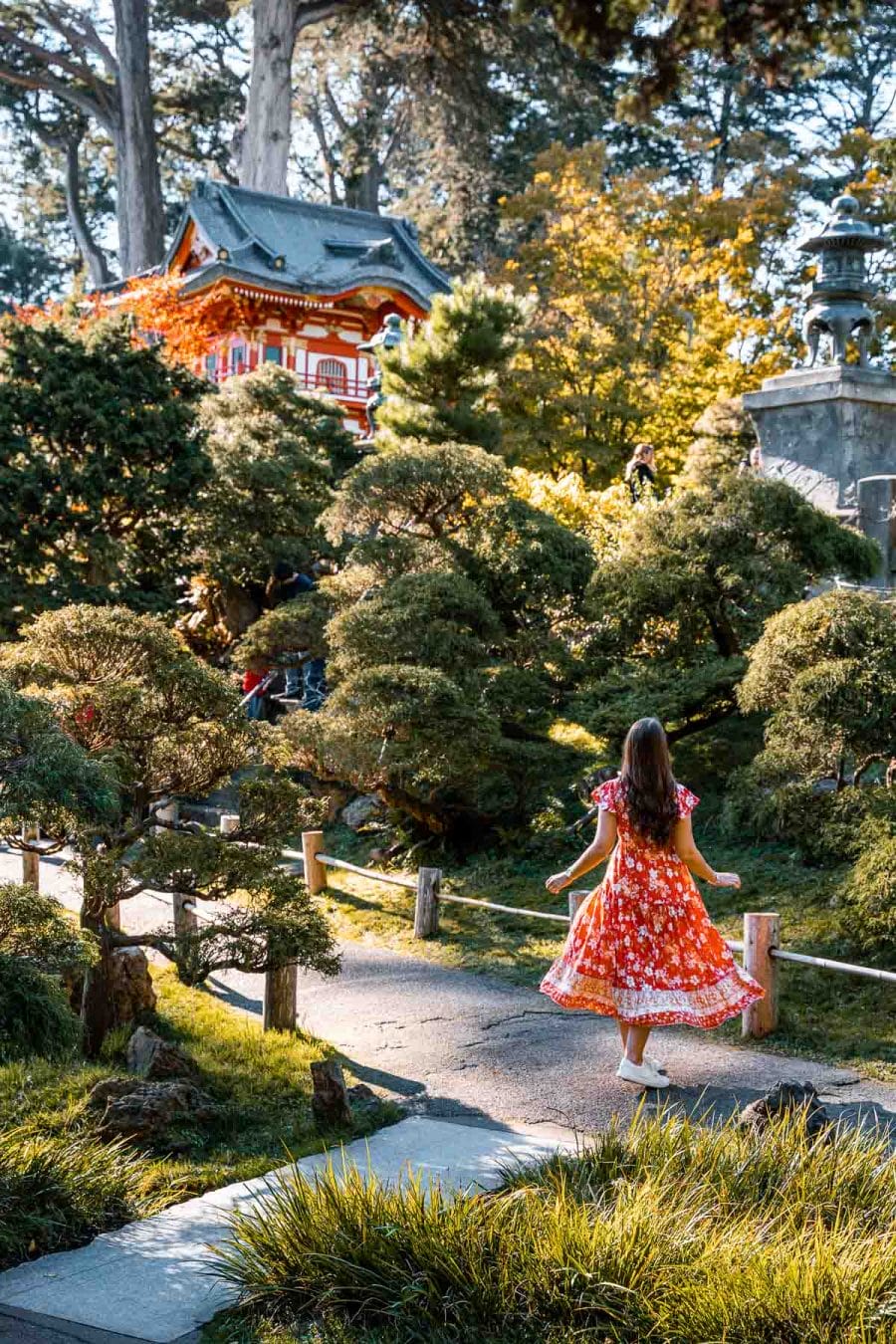 Girl in red dress in the Japanese Tea Garden in San Francisco
