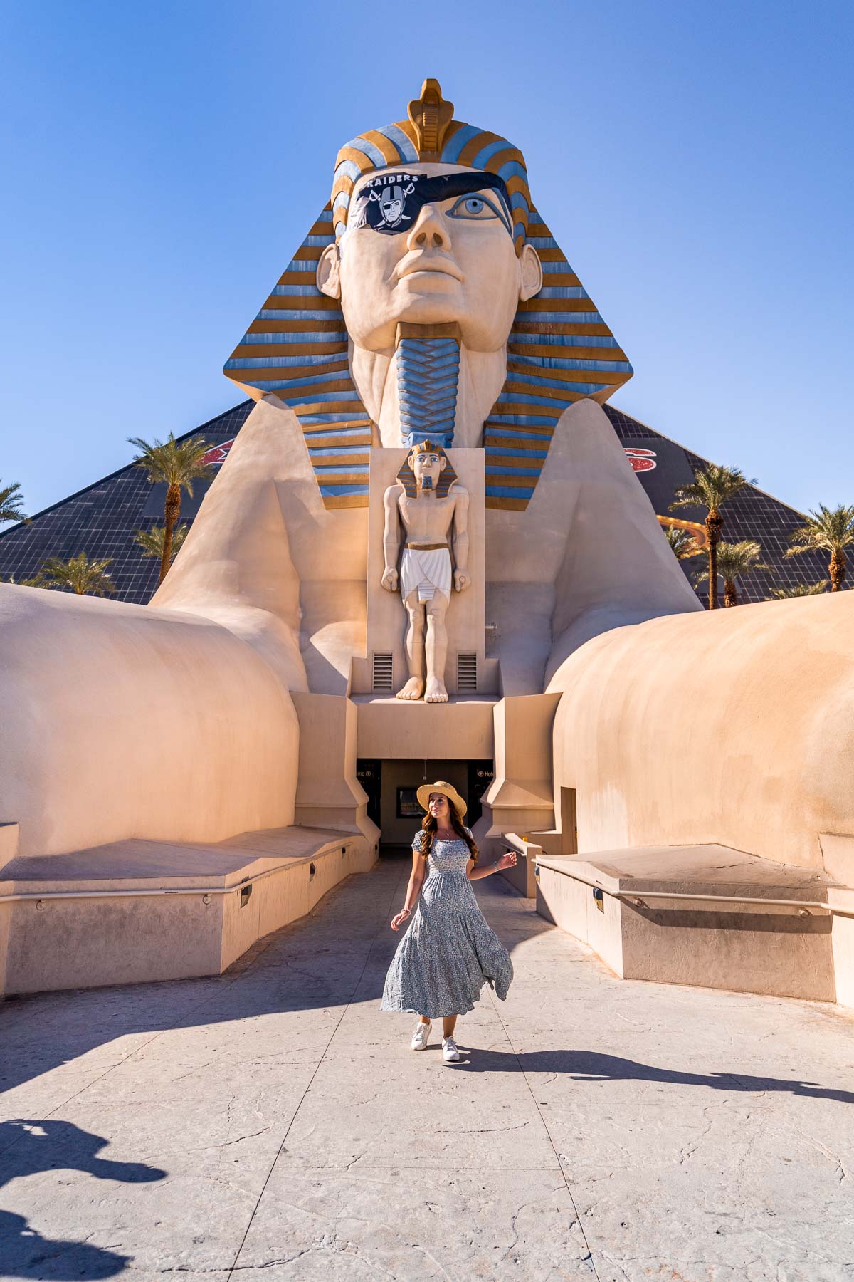 Girl in front of a sphinx statue at Luxor Hotel & Casino in Las Vegas