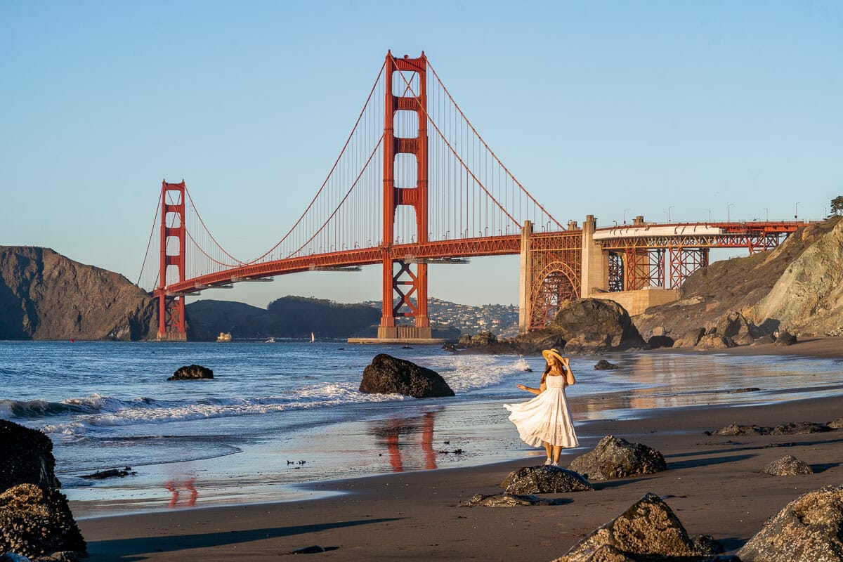 Girl in white dress at Marshall’s Beach, one of the most instagrammable places in San Francisco