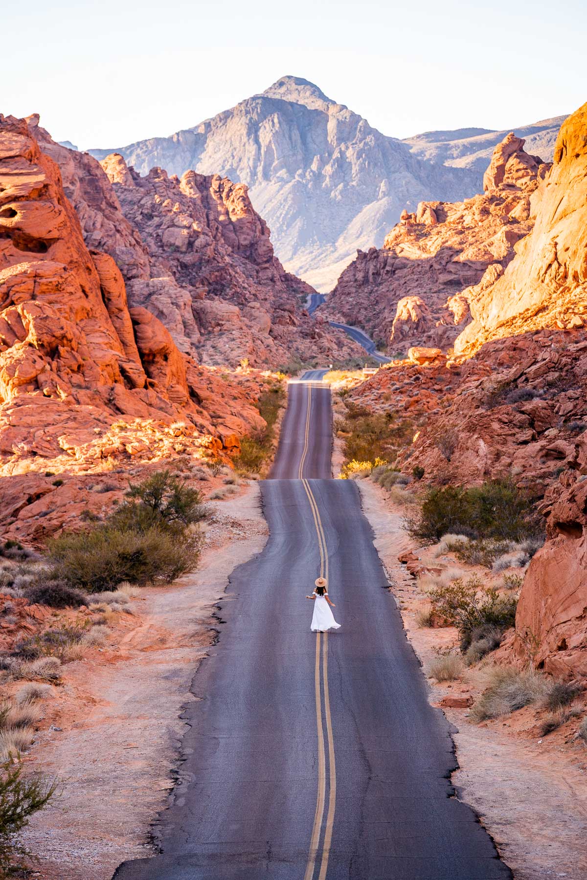 Girl in white on Mouse's Tank Road at sunrise