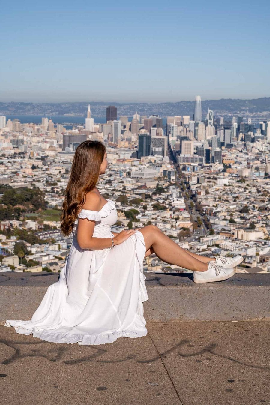 Girl in white dress at Twin Peaks in San Francisco
