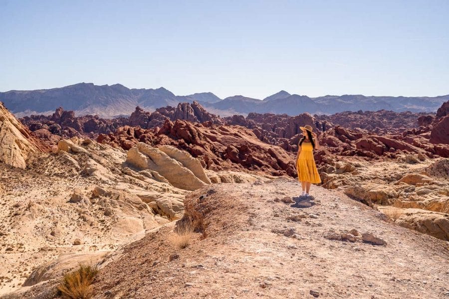 Girl in yellow dress at the Fire Canyon Silica Dome viewpoint