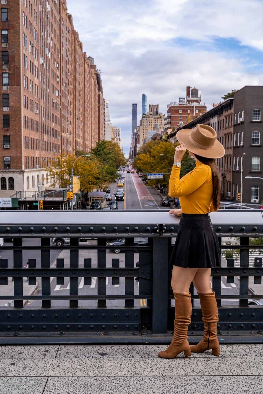 Girl on the High Line in New York, overlooking Hudson Yards