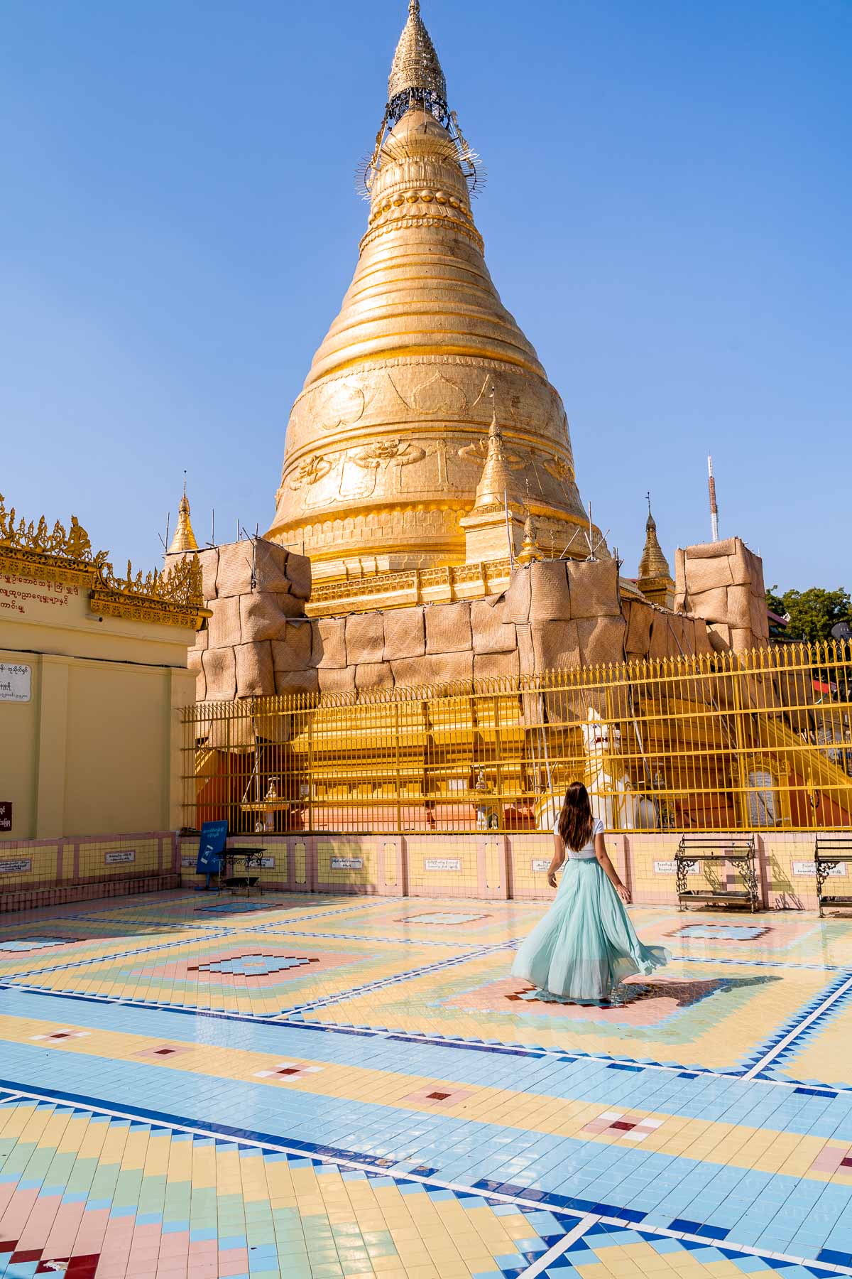 Girl in blue skirt at Soon U Ponya Shin Pagoda in Sagaing, Myanmar