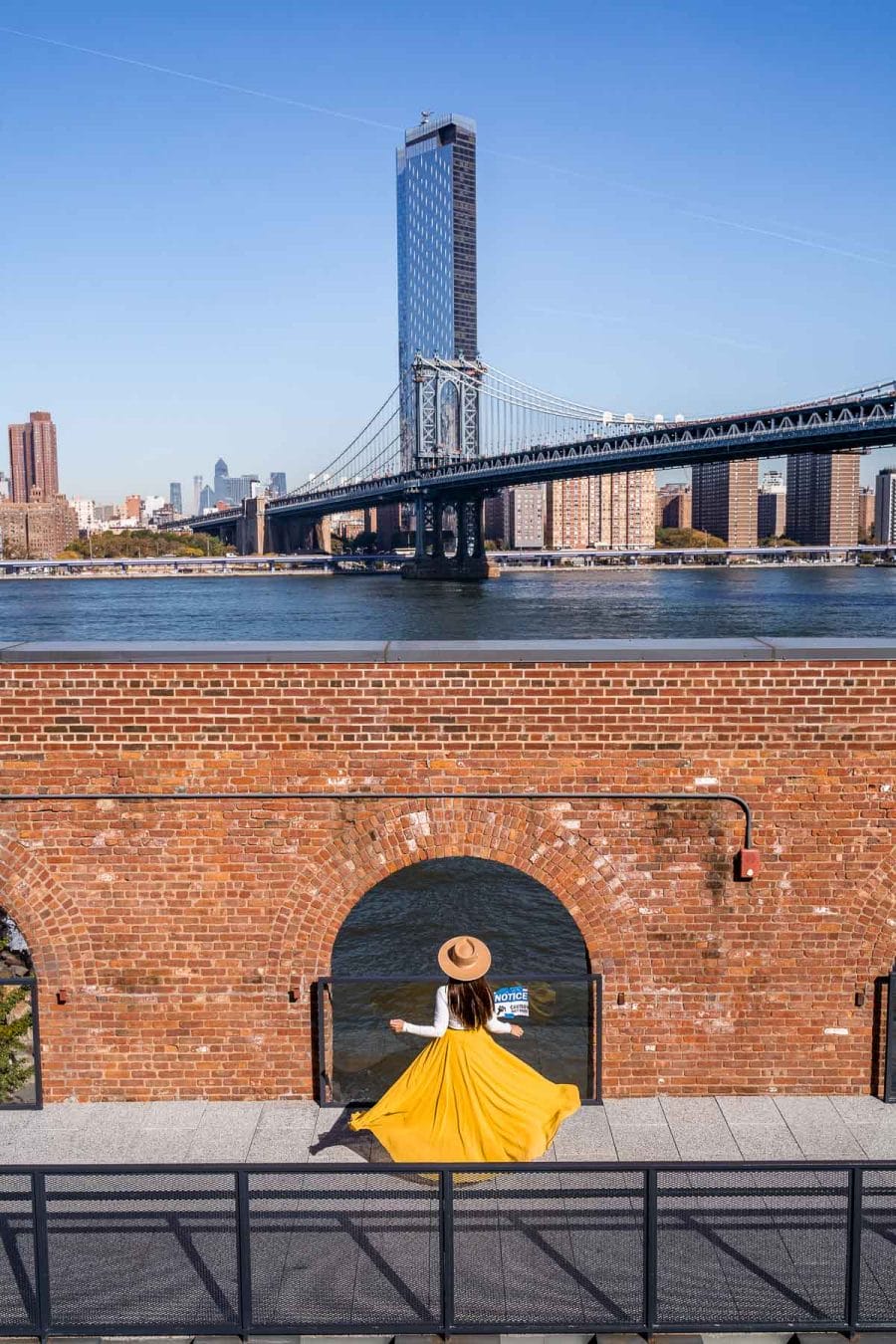 Girl in yellow skirt at the rooftop of Time Out Market New York