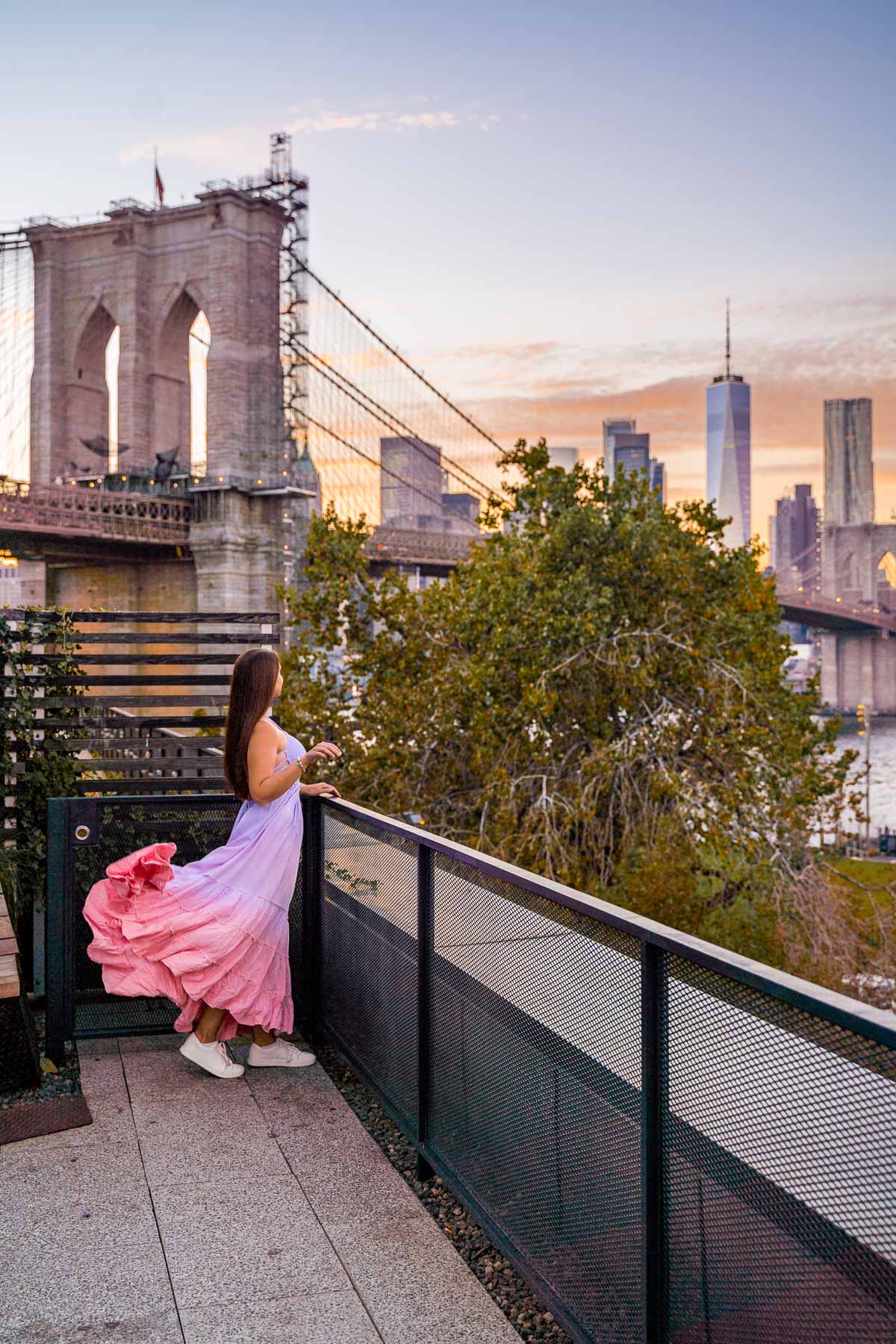 Girl in pink dress at the rooftop of Time Out Market New York