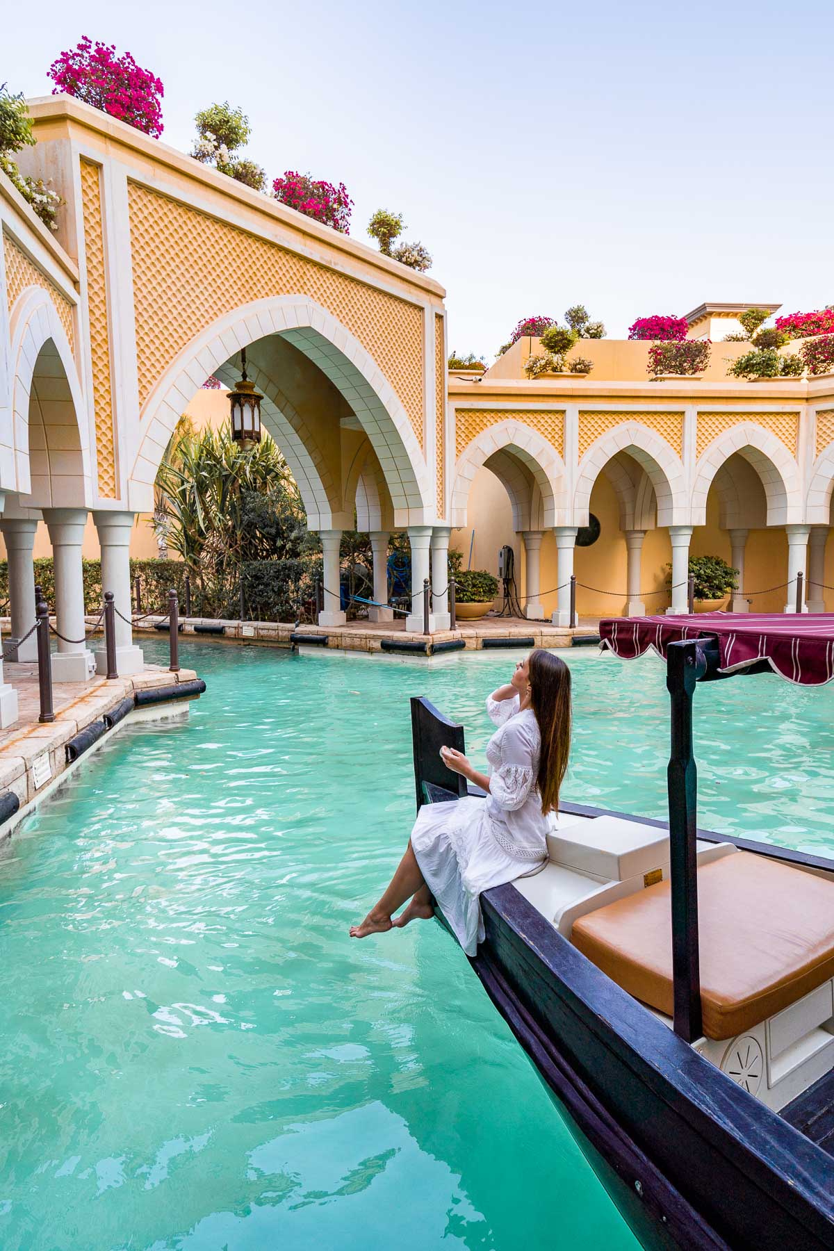Girl sitting on an abra at Shangri-La Abu Dhabi