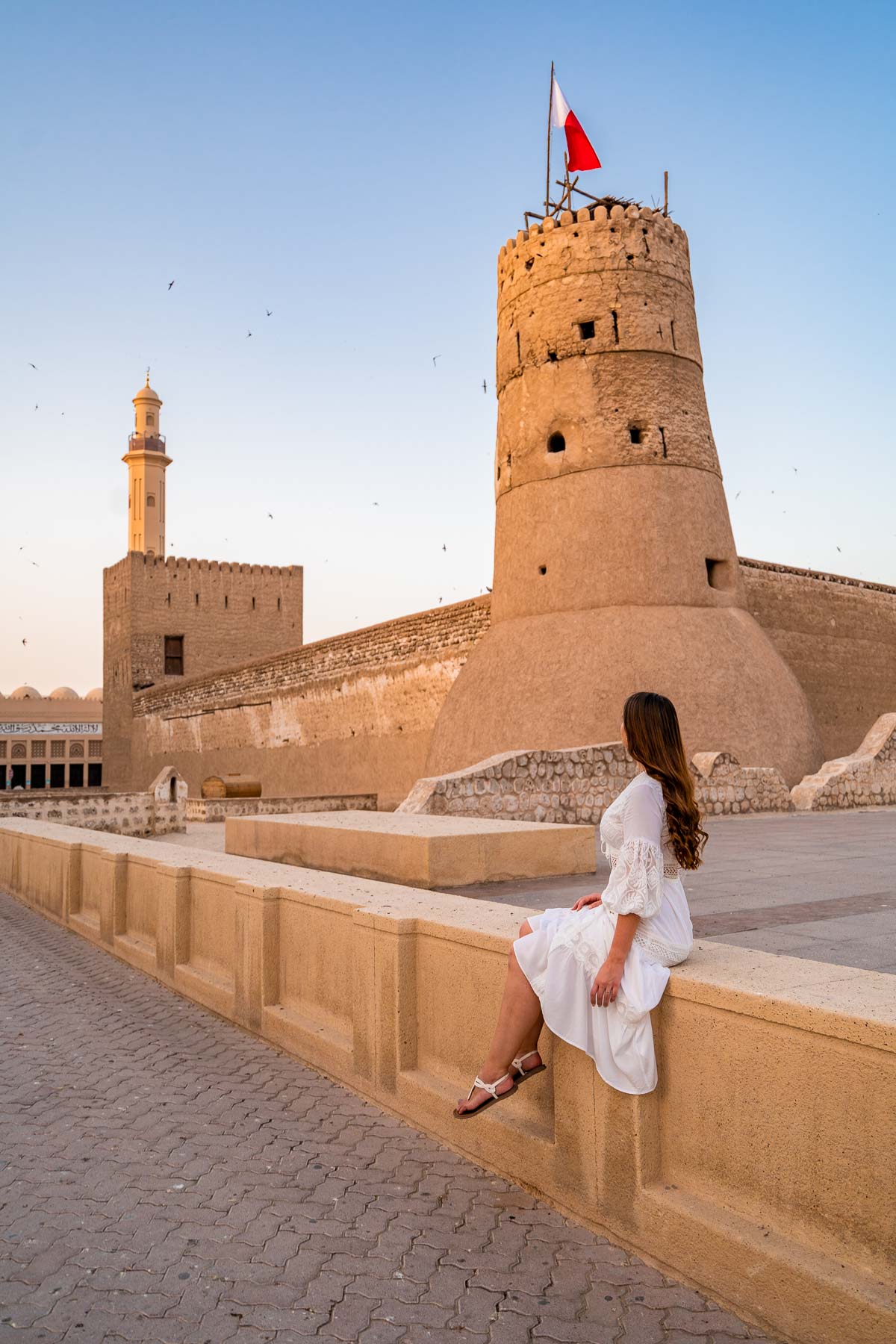 Girl in front of the Al Fahidi Fort (Dubai Museum)