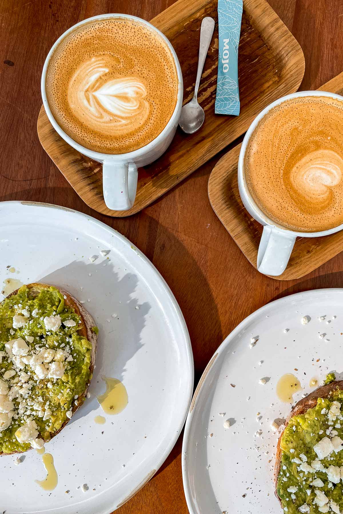 Coffees and avocado toasts at Mojo Cafe in Chicago