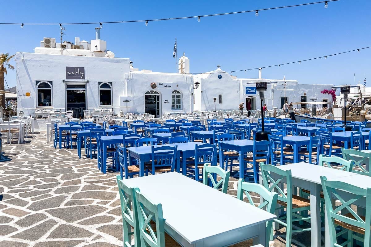 Turquoise and blue tables at Sigi Ikthios in Naussa, Paros