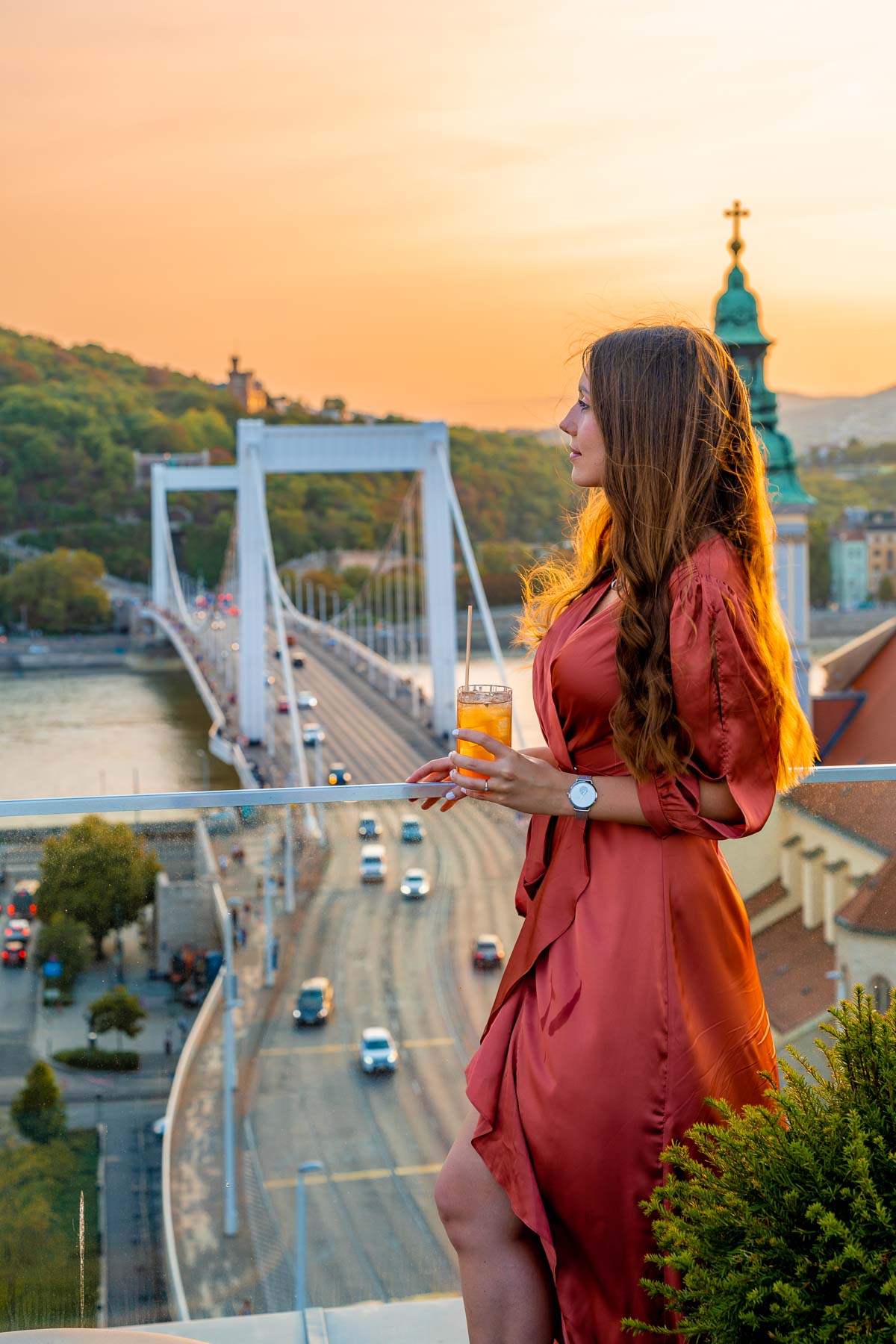Girl watching the sunset at The Duchess at Matild Palace