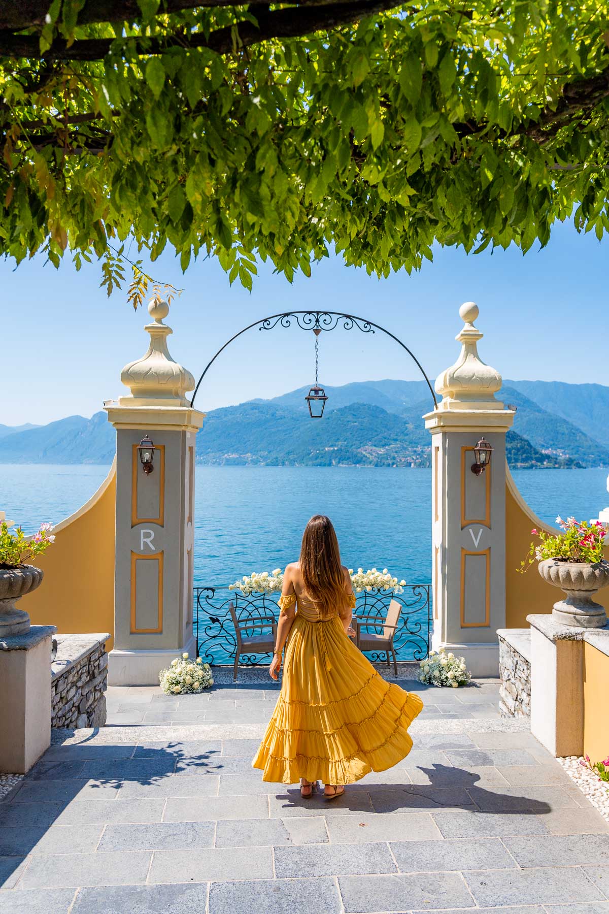 Girl in yellow dress at Bar Giardino at Hotel Royal Victoria in Varenna, Lake Como